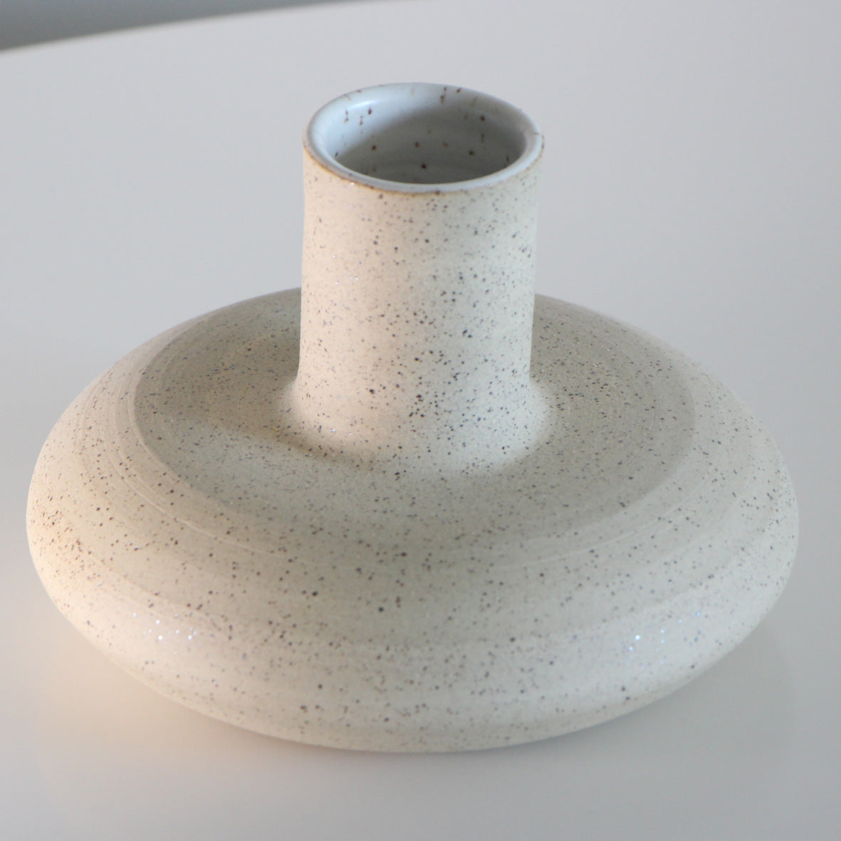 white ceramic vase |Saturn